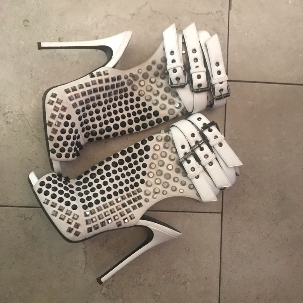 Gently worn Guiseppe Zanotti spiked heel toe outs